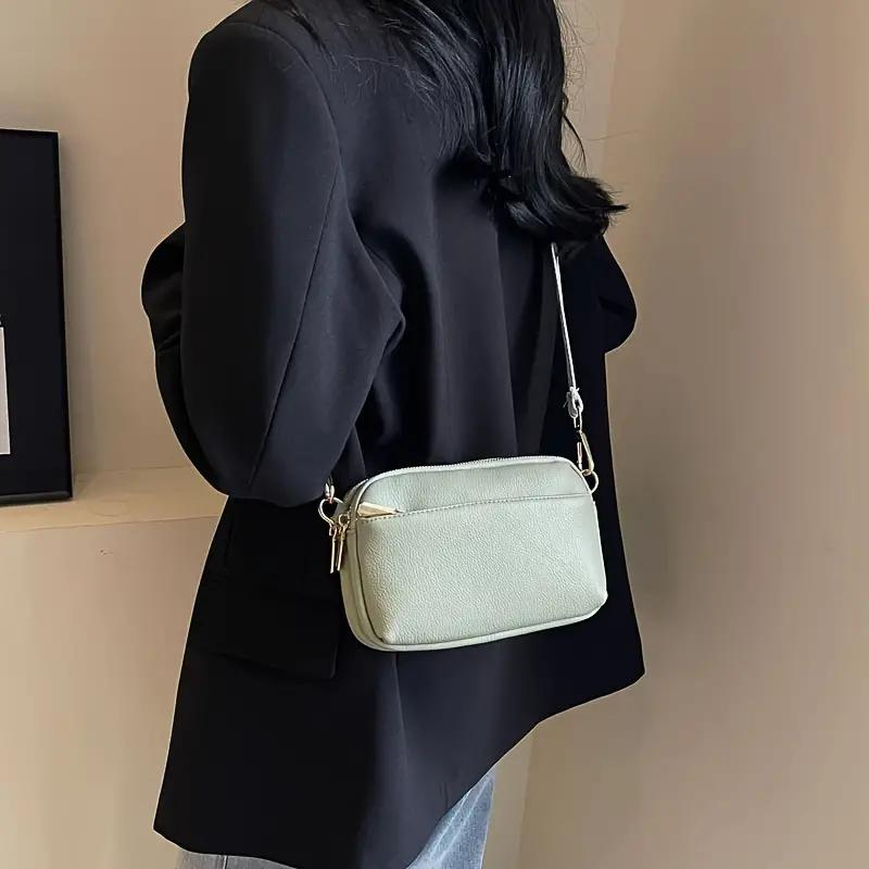 Crossbody Tasche mit Musterriemen & Gold