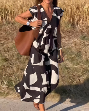 Fließendes Kleid mit markantem Muster