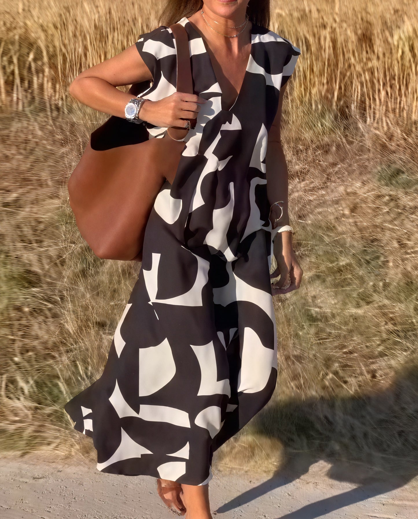 Fließendes Kleid mit markantem Muster