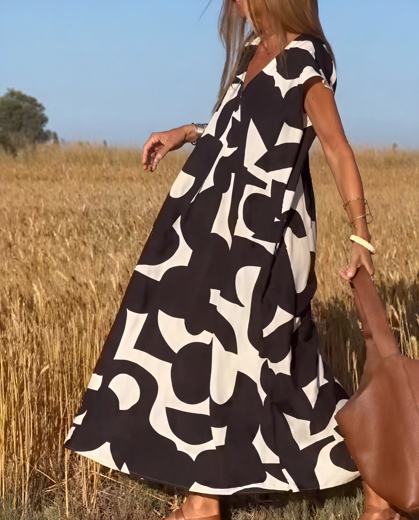 Fließendes Kleid mit markantem Muster