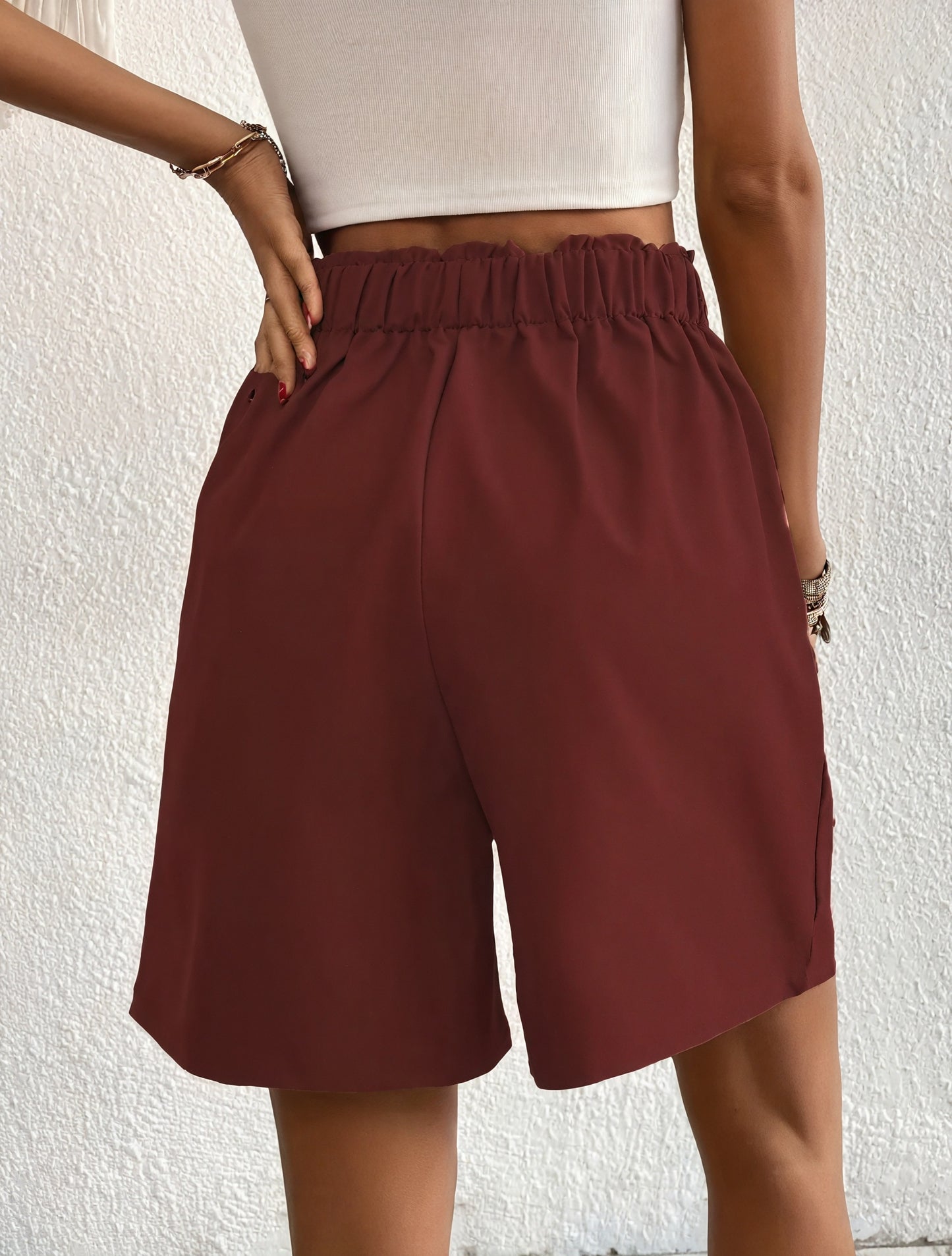 Weite High-Waist Shorts mit Knopfdetail