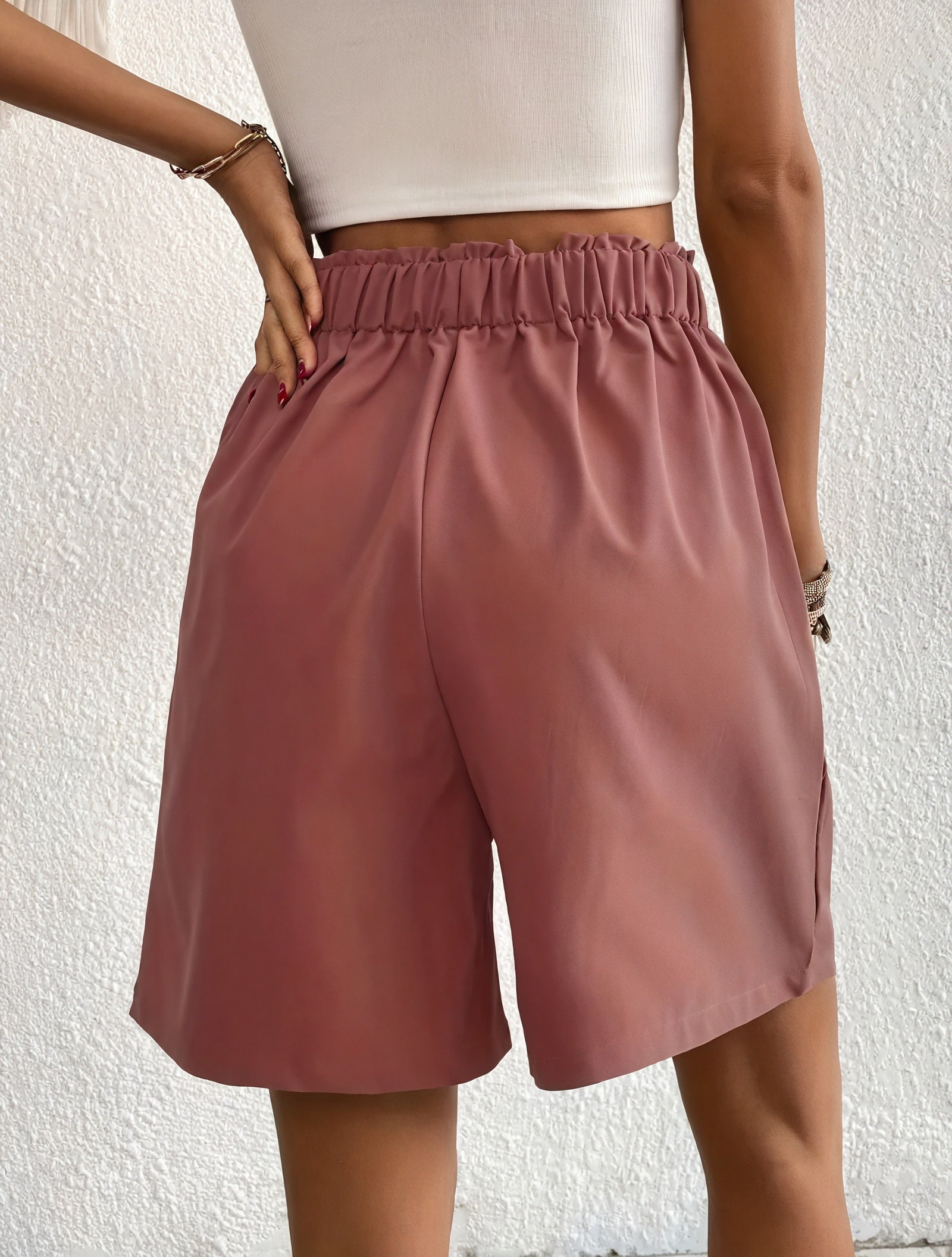 Weite High-Waist Shorts mit Knopfdetail