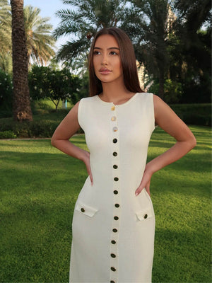 Figurbetontes Strickkleid mit goldenen Knöpfen